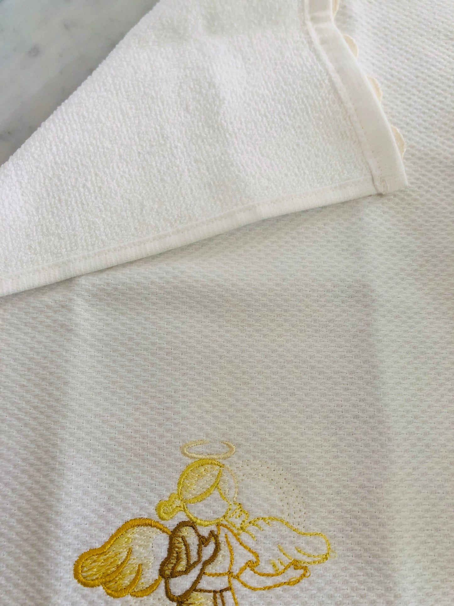 figertip towel embroidered with angels