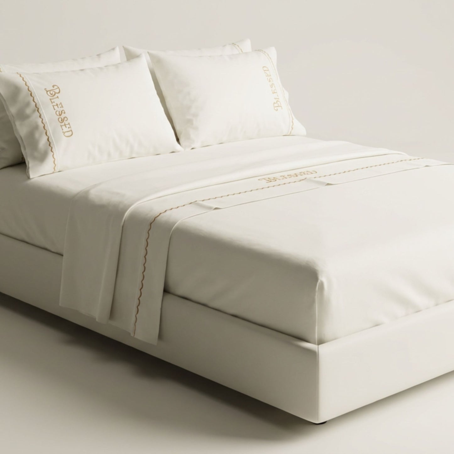 Blessed embroidered bed sheets in 600 thread count 100% cotton. White luxury bedding with scallop trim and custom color embroidery.