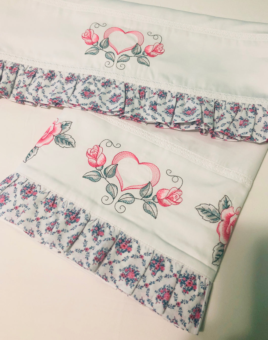 bed sheets embroidered with roses