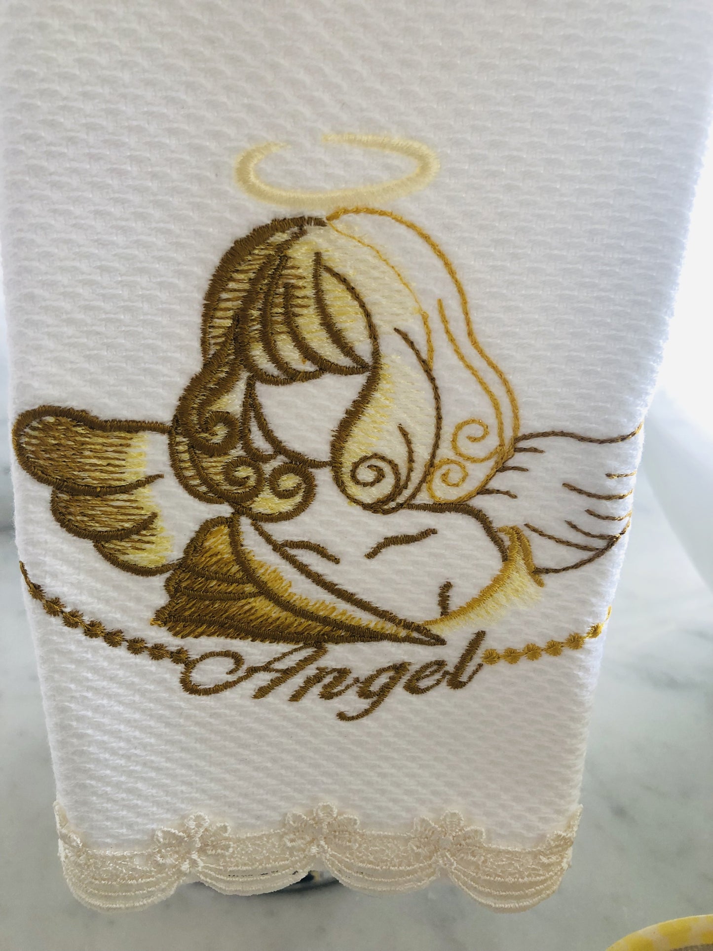 figertip towel embroidered with angels