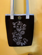 Load image into Gallery viewer, Black tote bag embroidered with a blue Mehendi design