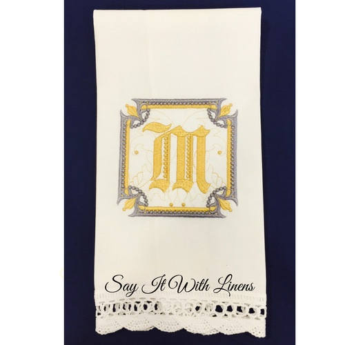 gold monogram guest towel