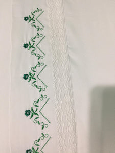 twin flat bed sheet embroidered with a green lace floral design 