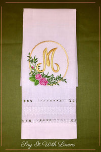 guest towel with delicate drawn-work stitches an monogrammed