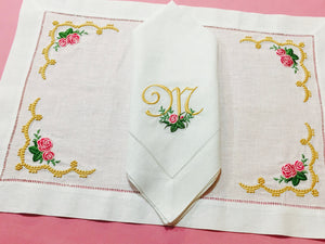 matching placemat and dinner table embroidered with roses