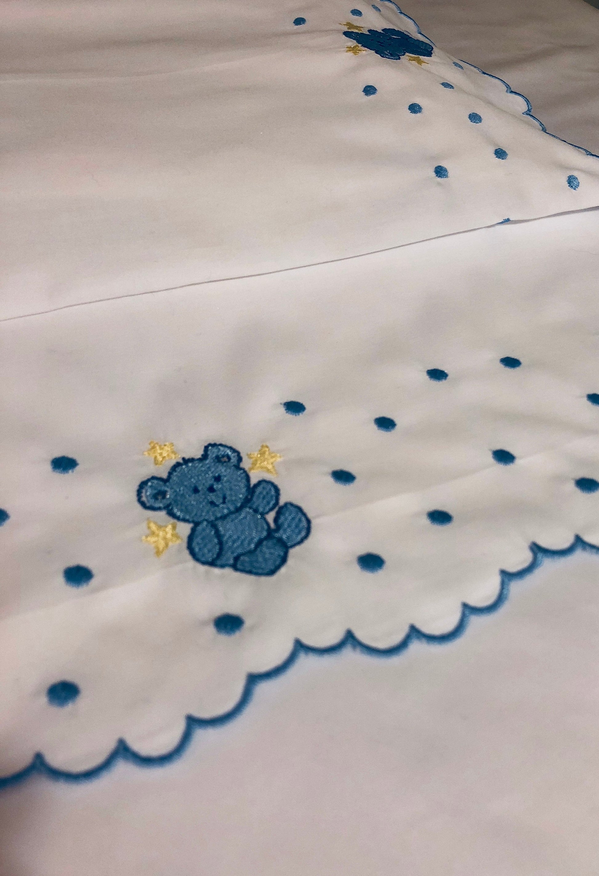 baby crib sheet set with blue embroidery